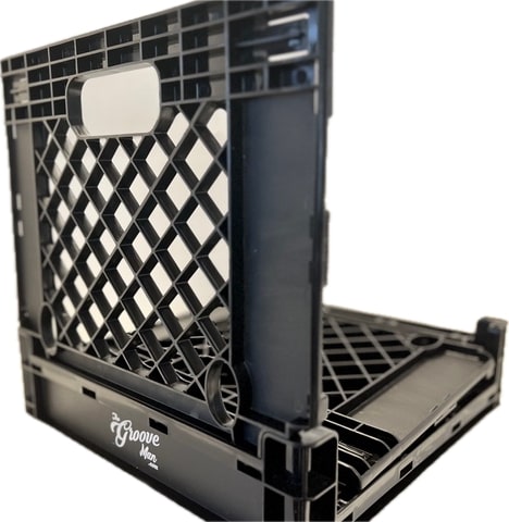 Alexander The Crate in a partially collapsed state, showing its sturdy plastic design and collapsibility for vinyl storage.