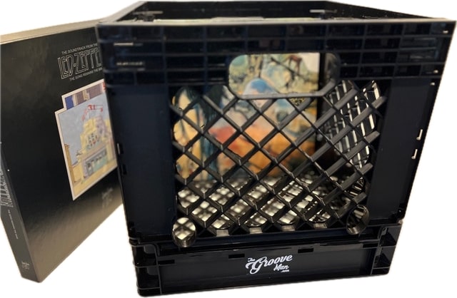 Alexander The Crate with vinyl records inside, showcasing its spacious capacity for storing up to 80 LPs securely.